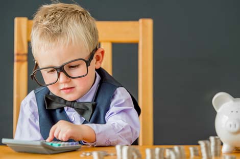 Young boy counting his change